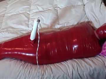 Hot brunette mummified by tape and vibed